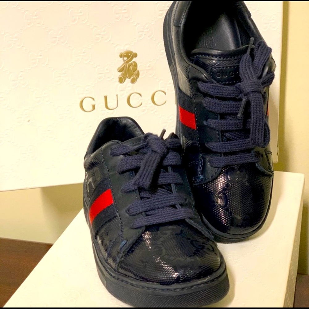 Boys size 11 Gucci sneakers. Only worn a few times still look new. No damage
